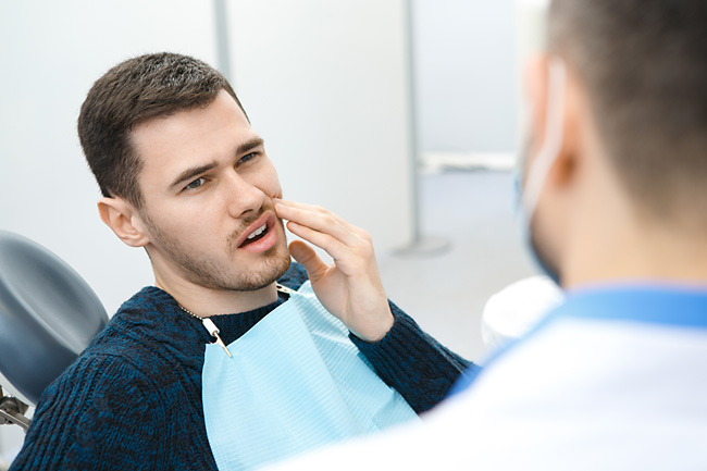Почему болит зуб после лечения